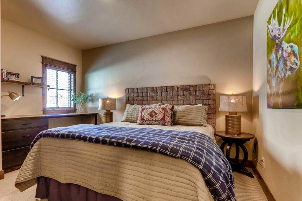 Cozy Canoe primary bedroom with window and desk